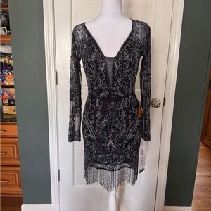 Elegant Black Long Sleeve Dress with Beaded Design